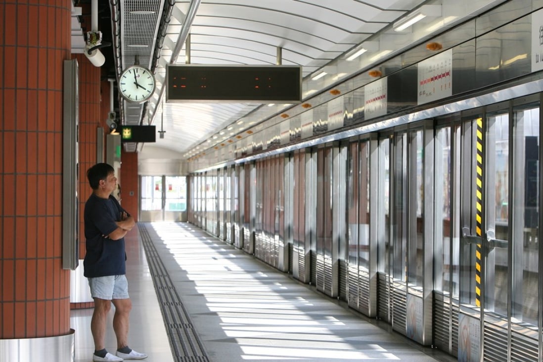 A passenger on the platform of the West Rail’s Kam Sheung Road Station. Photo: May Tse