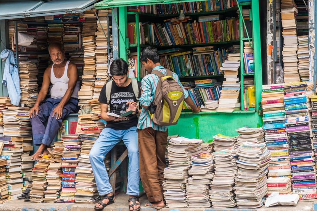 Indian students check out books at an old street stall in Kolkata in West Bengal.