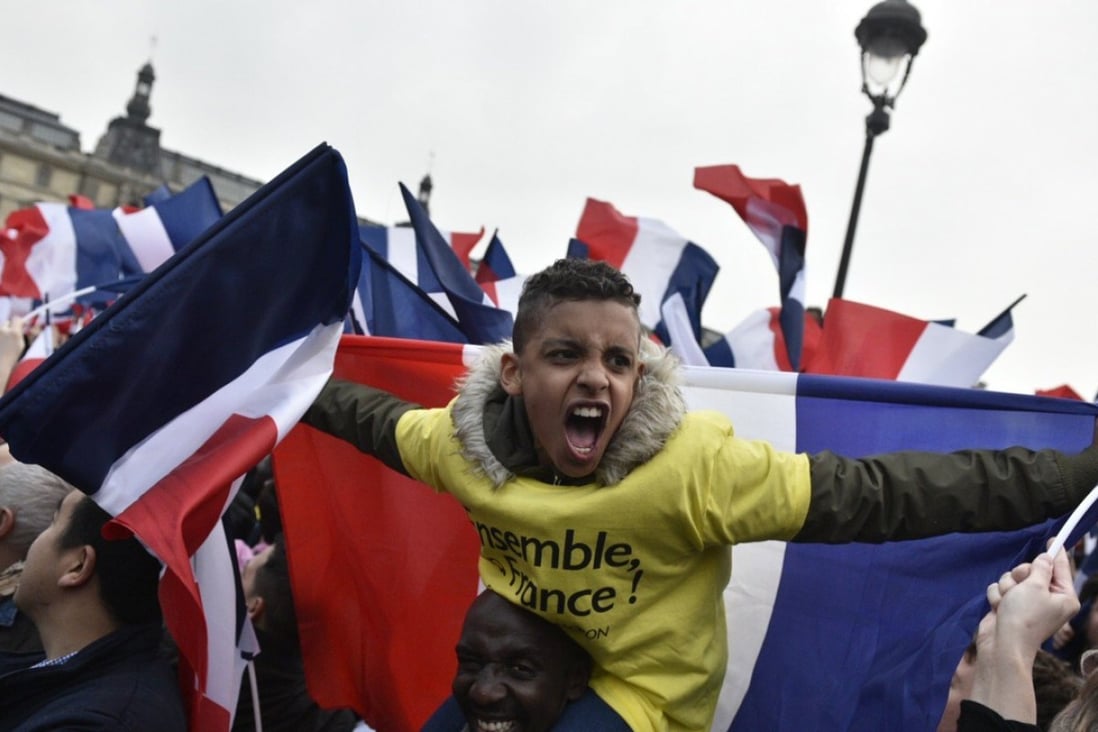 Supporters of French President Emmanuel Macron during the election campaign. Photo: EPA