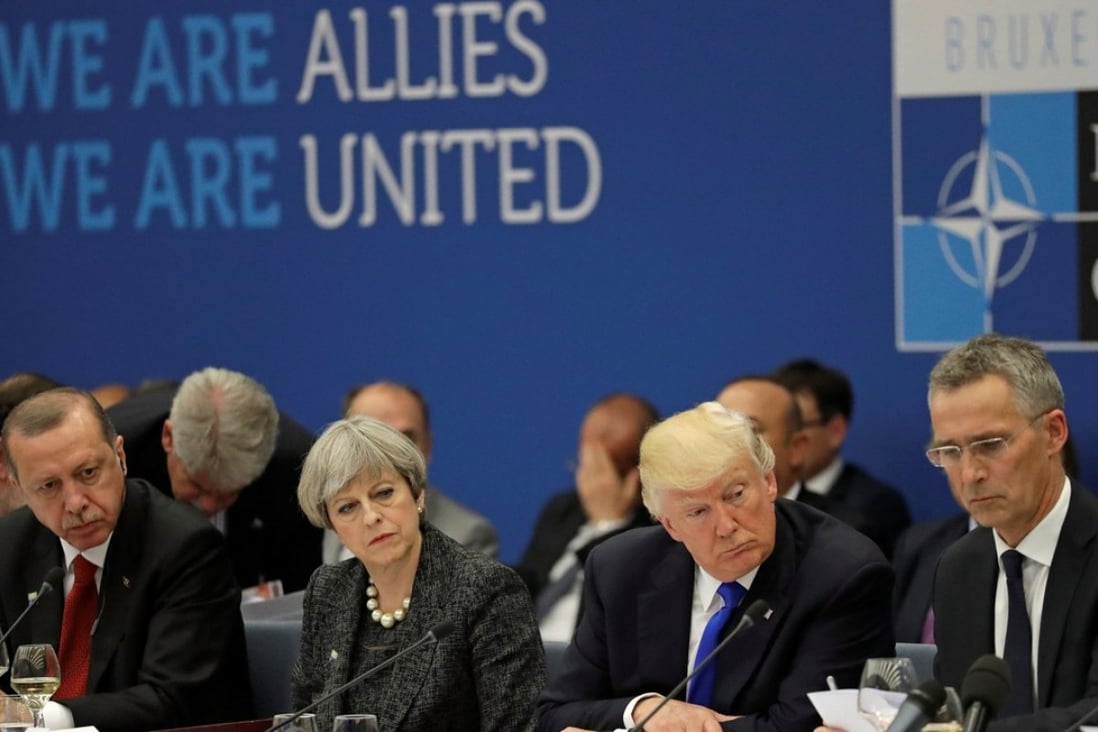 From L-R, Turkish President Recep Tayyip Erdogan, Britains's Prime Minister Theresa May, US President Donald Trump and NATO Secretary General Jens Stoltenberg attend a working dinner meeting at the NATO headquarters during a summit of the heads of state and government in Brussels, Belgium. Photo: Reuters