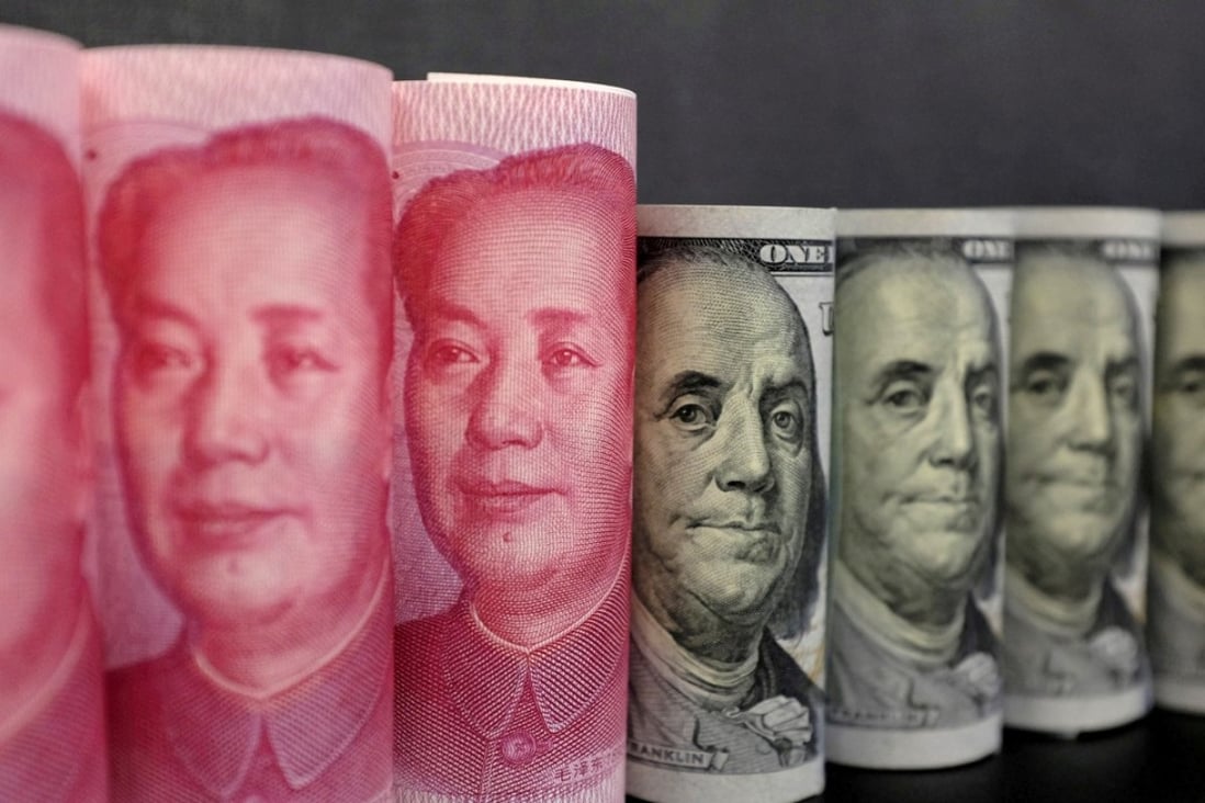 The yuan is restricted to moves of no more than 2 per cent either side of the reference rate. Photo: Reuters