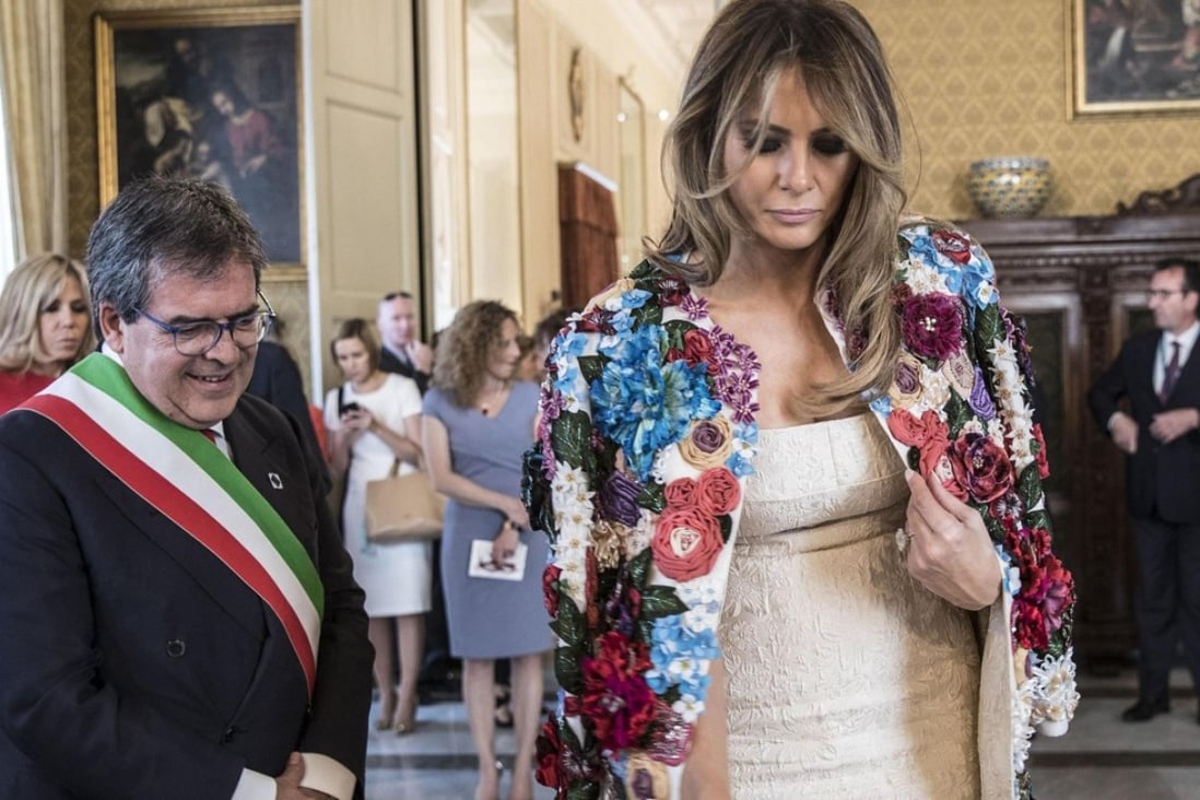A handout photo made available by Chigi Palace Press Office shows Catania's Mayor Enzo Bianco (L) with US First Lady Melania Trump (R), during a visit by the G7 first ladies in Catania, Italy. Photo: EPA