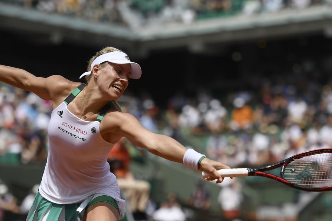 Germany's Angelique Kerber is at full stretch against Ekaterina Makarova at the French Open. Photo: AFP