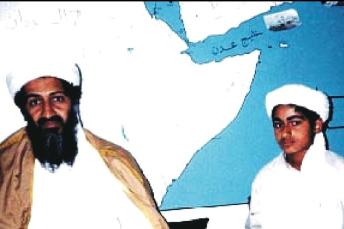 No confirmed photographs exist of the young terrorist Hamza bin Laden (right) since his boyhood, when he was portrayed multiple times as an adoring son posing with his famous father. File photo: Handout
