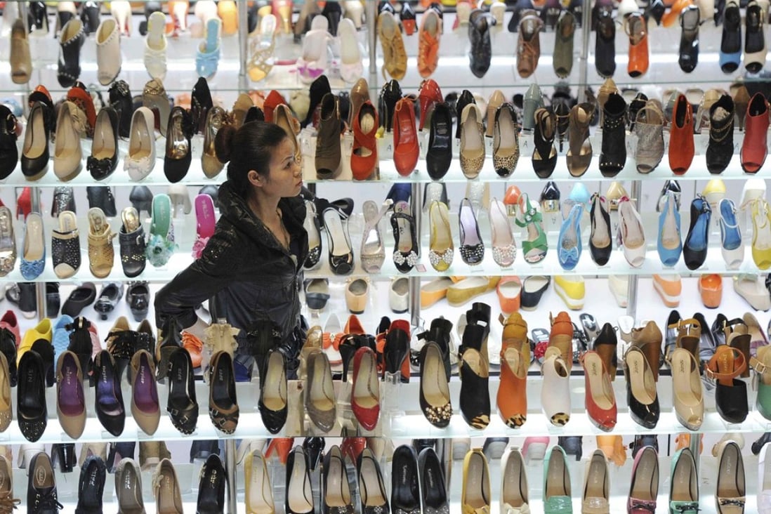 Hong Kong-listed Daphne shuttered more than 800 stores in 2015 and another 1,000 last year. Photo: Reuters