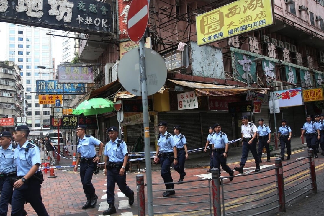 Police investigating a fight involving South Asian Men in Yau Ma Tei last October. Photo: Sam Tsang