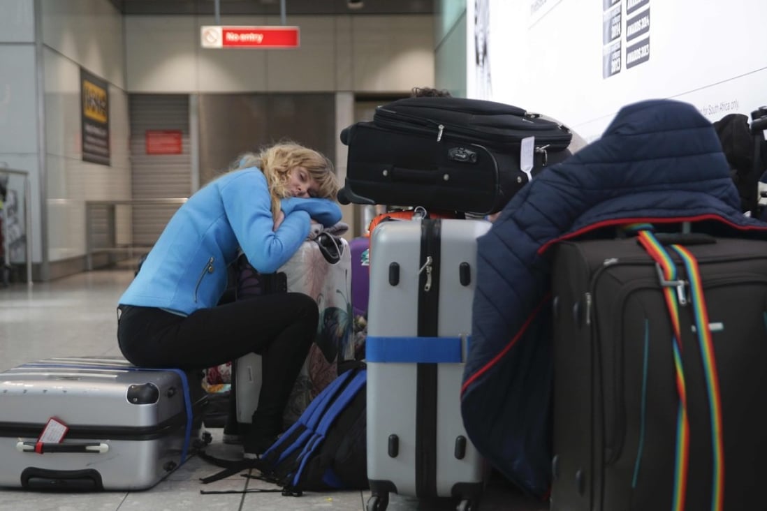 Heathrow is not among the top airports for sleeping if your flight’s delayed, as British Airways passengers, such as this one, caught up in last weekend’s computer-crash chaos can attest. Picture: AFP