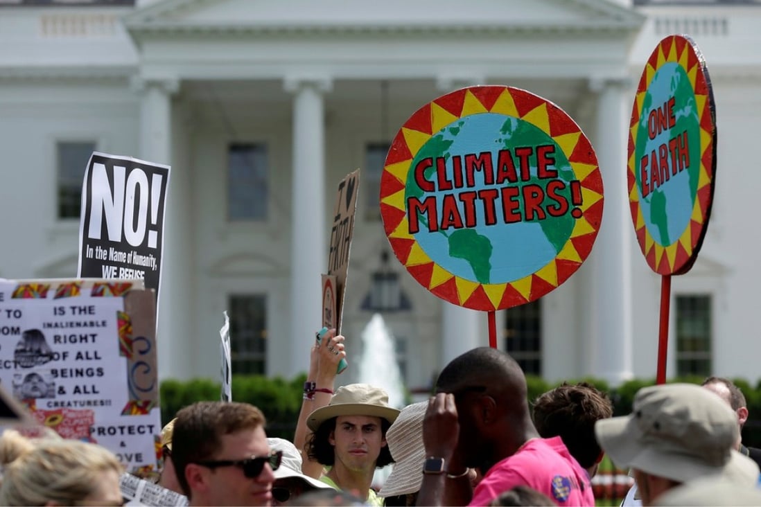 Protesters take part in the People’s Climate March at the White House in Washington on April 29. Photo: Reuters