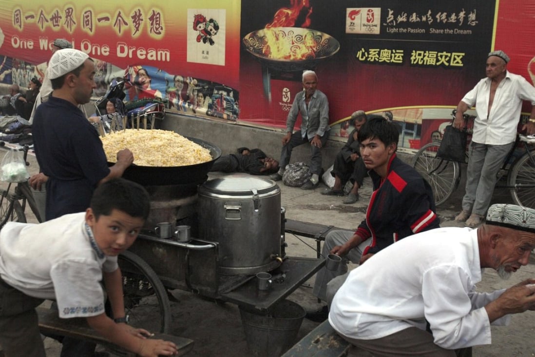 A file picture of Muslim Uygurs at a food stall in Kashgar in China's western Xinjiang region. Photo: Associated Press