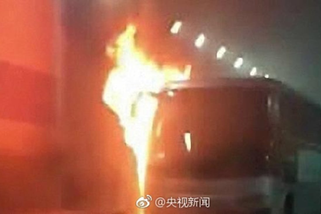 The bus on fire inside a road tunnel. Photo: Handout