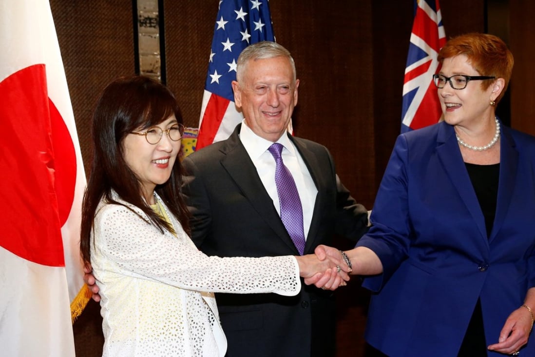 Japanese Defence Minister Tomomi Inada, US Secretary of Defence James Mattis and Australian Defence Minister Marise Payne pose before their trilateral meeting on the sidelines of the Shangri-La Dialogue in Singapore on Saturday. Photo: Reuters