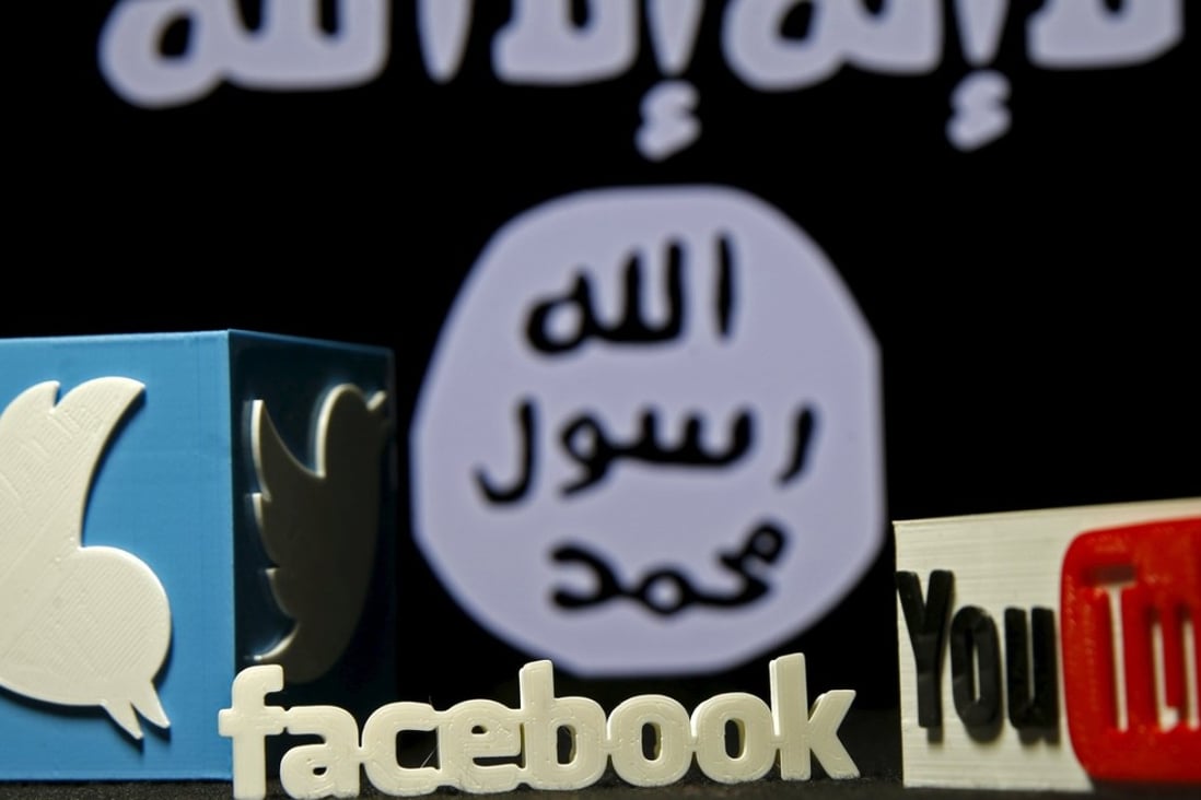 Three-dimensional plastic representations of the Twitter, Facebook and YouTube logos in front of a flag of so-called Islamic State, displayed in the Bosnian city of Zenica, on February 3 last year. Terrorist groups rely heavily on social media and the internet to spread jihadist propaganda. Photo: Reuters