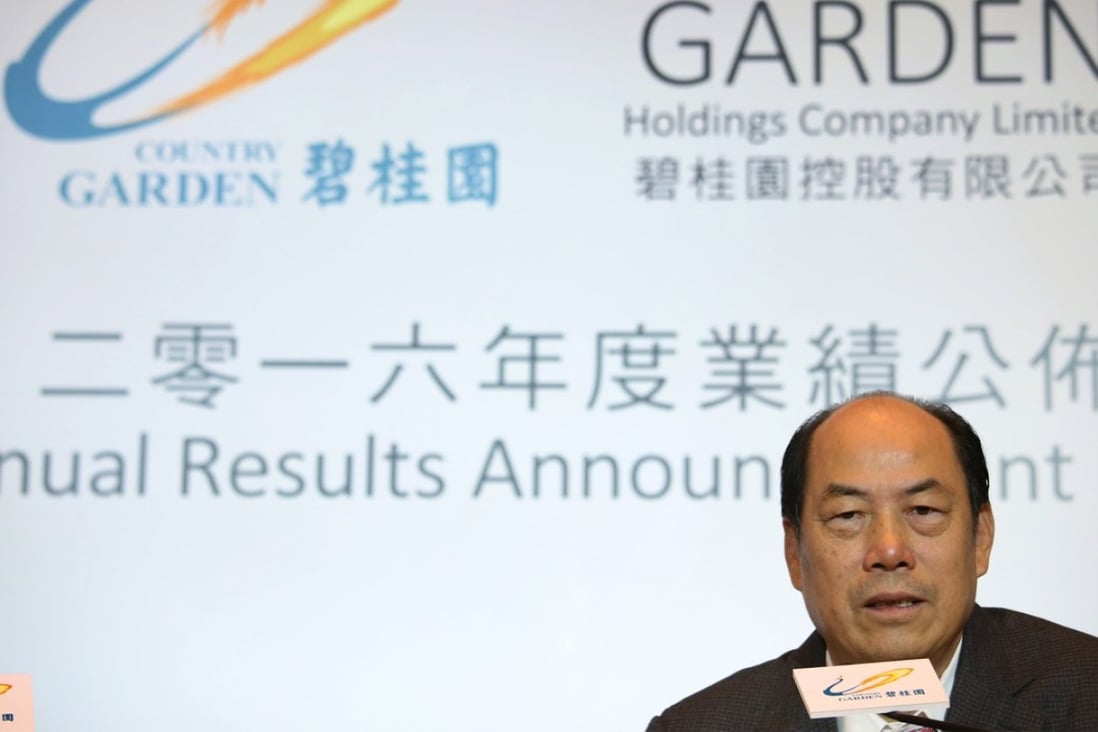 Country Garden chairman Yeung Kwok-keung attends the developer’s annual results briefing in March. Its contracted sales fell from 53.5 billion yuan in April to 40 billion yuan in May. Photo: David Wong