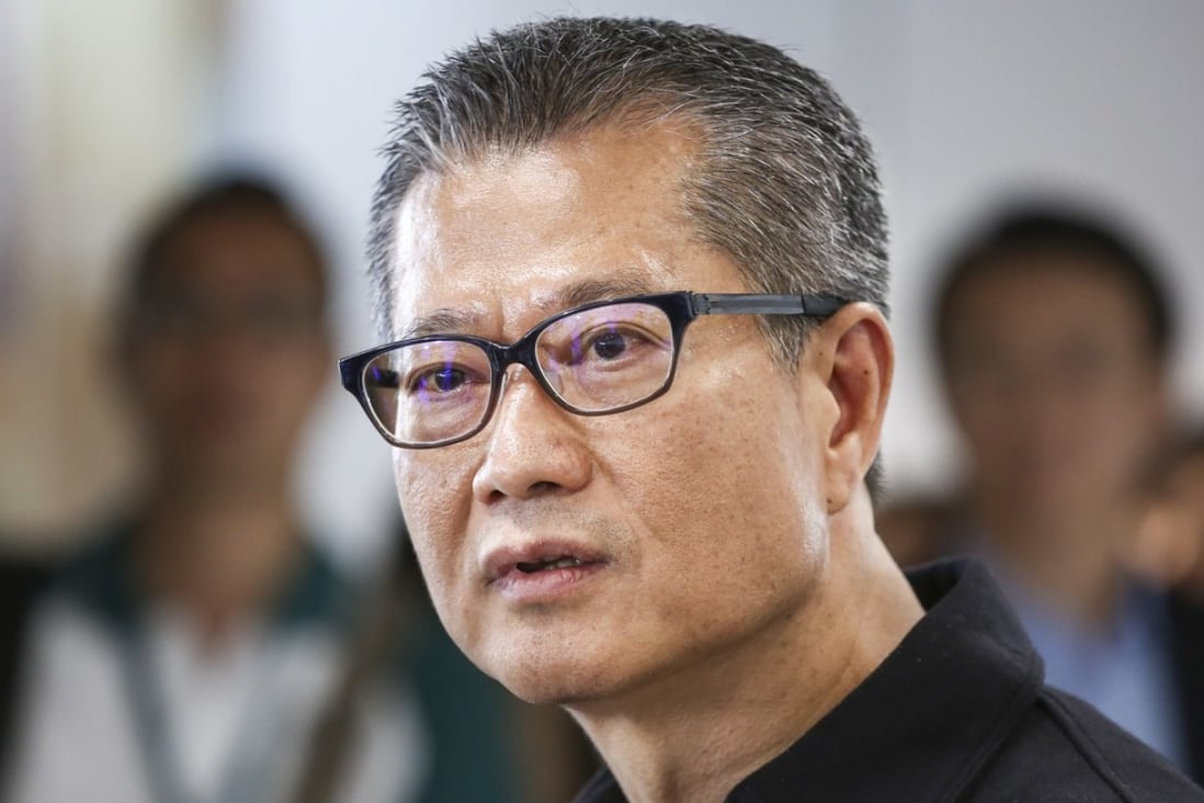 Financial Secretary Paul Chan reminded people that it is a criminal offence to split residential property purchases by using other people’s entitlements. Photo: Jonathan Wong