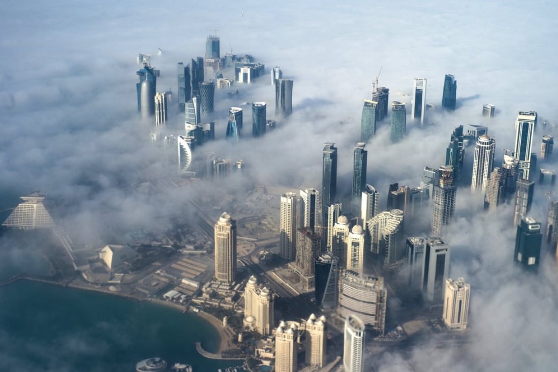 The sun rises over Doha in Qatar. Egypt, Saudi Arabia, Bahrain and the United Arab Emirates have cut off diplomatic ties with Qatar, citing its support for terrorism. Photo: EPA