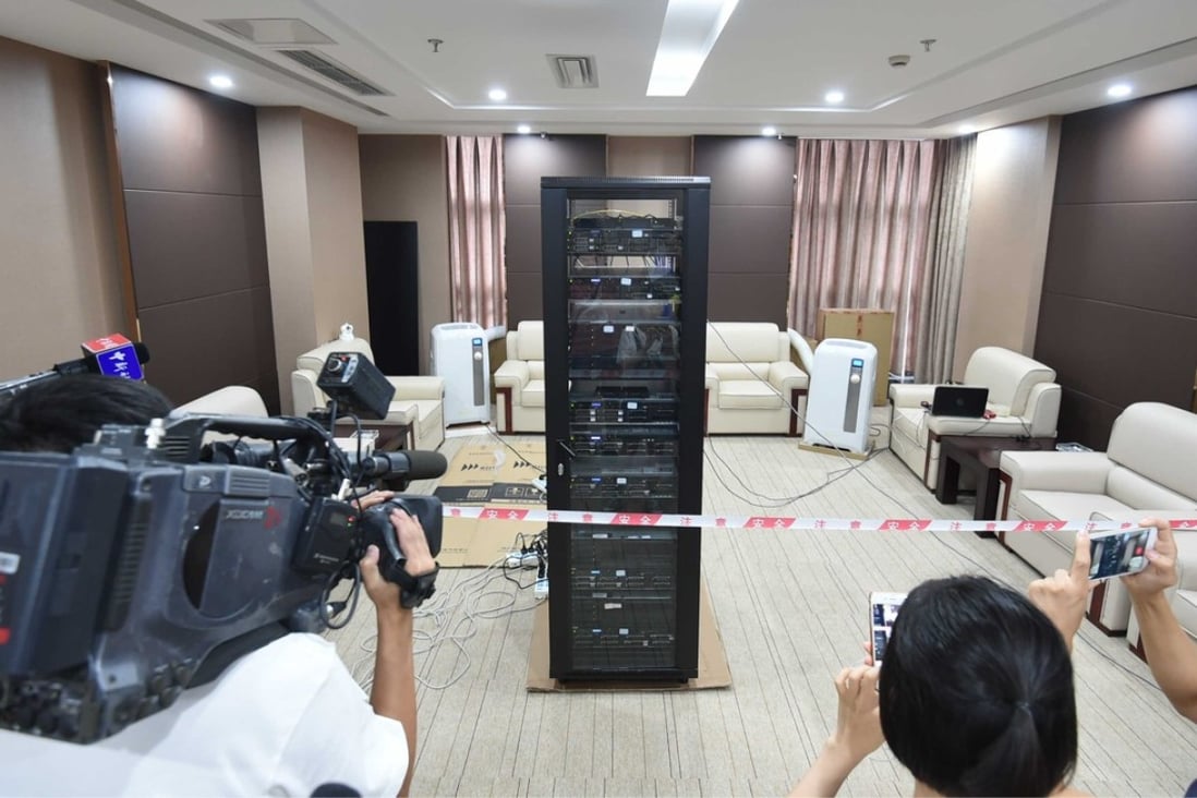 Media filming AI-MATHS as it sat the test in Chengdu. Photo: Xinhua