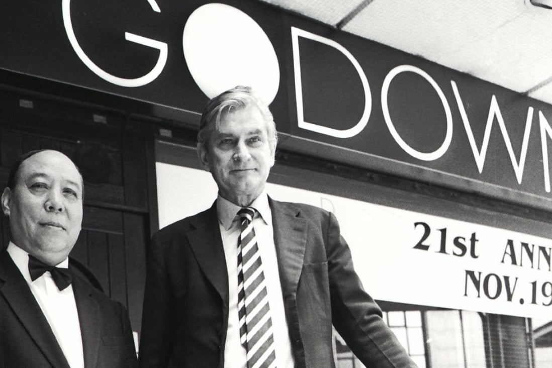 Godown’s owner Bill Nash (right) and its long-serving doorman outside the Hong Kong bar and restaurant. Picture: SCMP