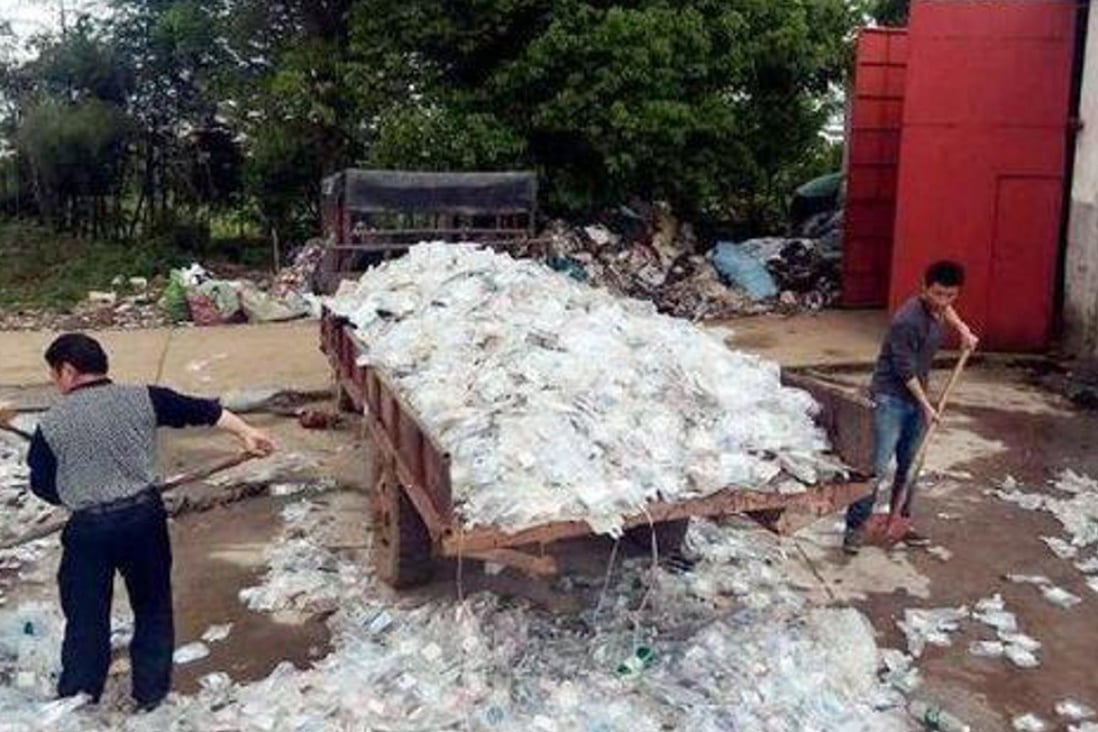 Piles of medical waste were found at a workshop in Miluo, Hunan province. Photo: Handout
