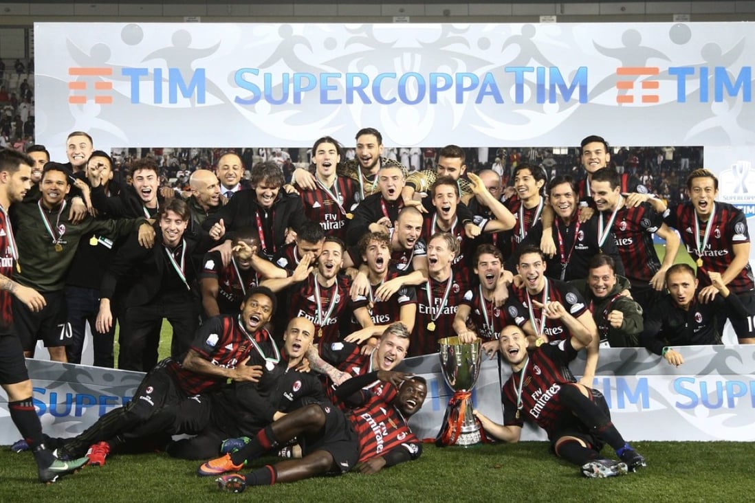 AC Milan players celebrate a win over Juventus in the Italian Super Cup final last year. In April, mainland investment company Sino-Europe Sports, headed by businessman Li Yonghong, invested €740 million in AC Milan. Photo: EPA