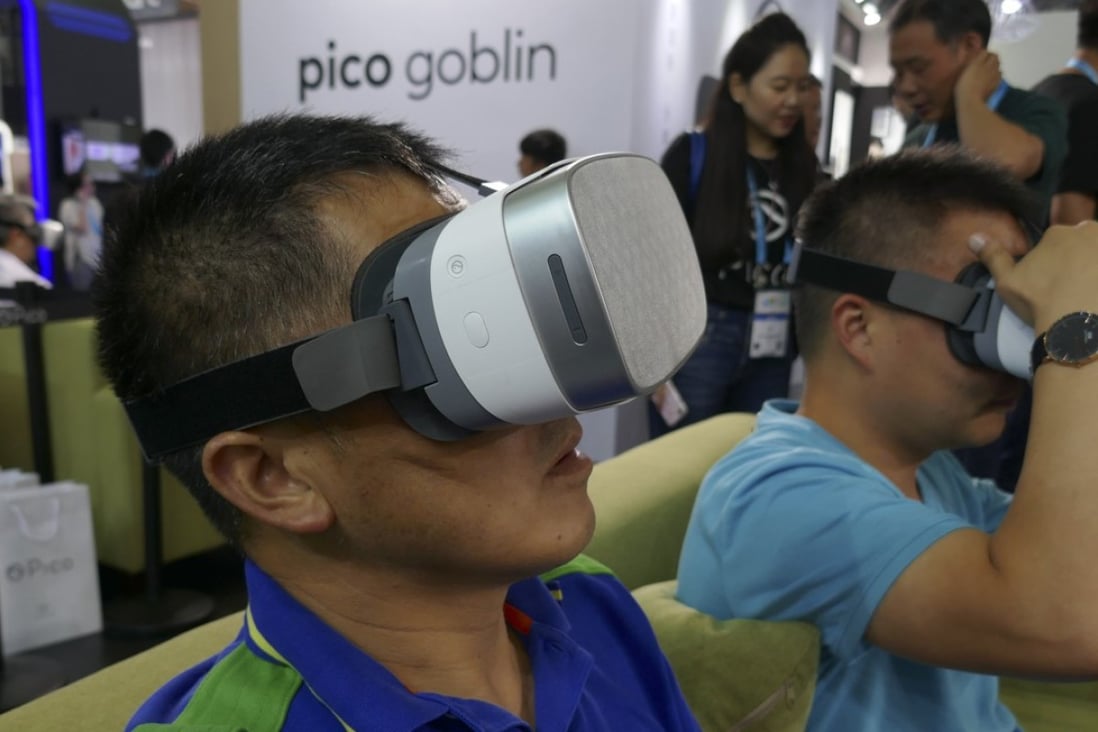 Visitors try Pico Goblin VR headsets at the Consumer Electronics Show Asia. Photo: Jamie Carter