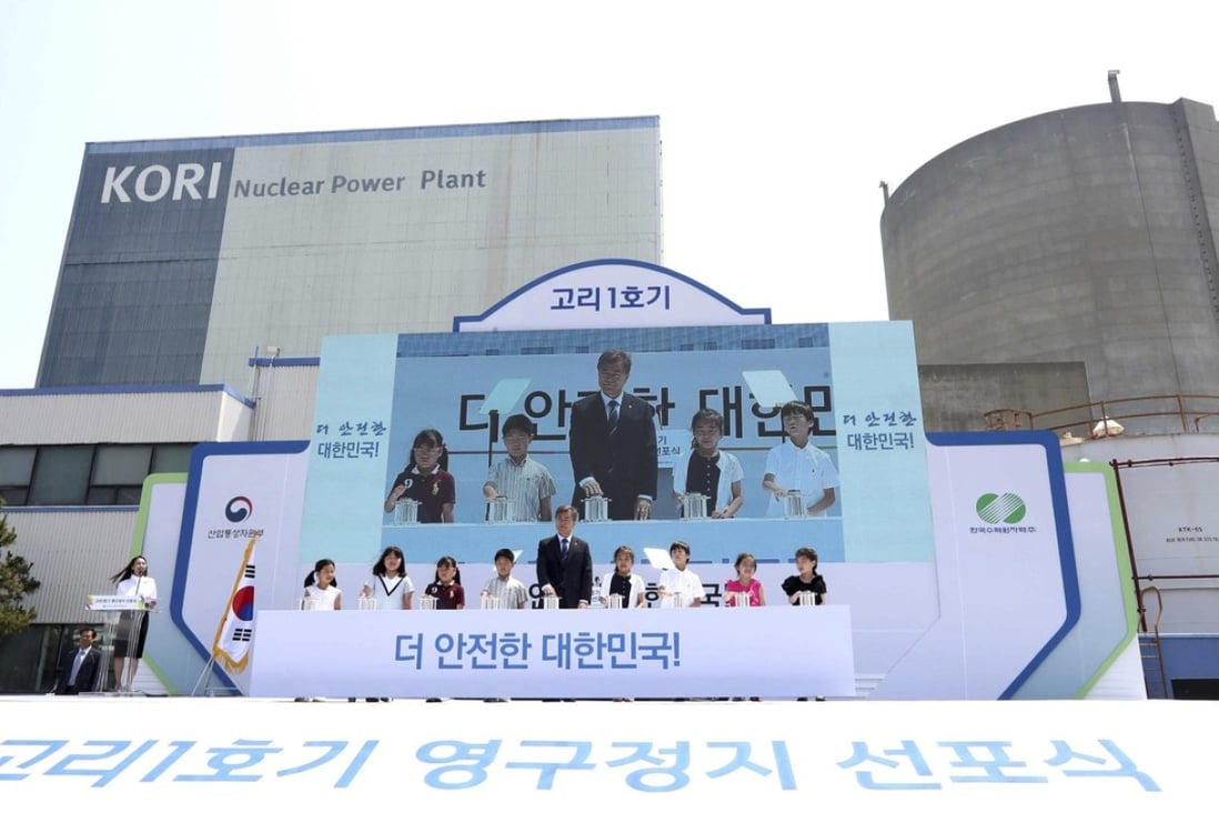 South Korean President Moon Jae-in, centre, attends a ceremony marking the shutdown of the country's oldest nuclear power plant, Kori 1, in Busan. Photo: AP
