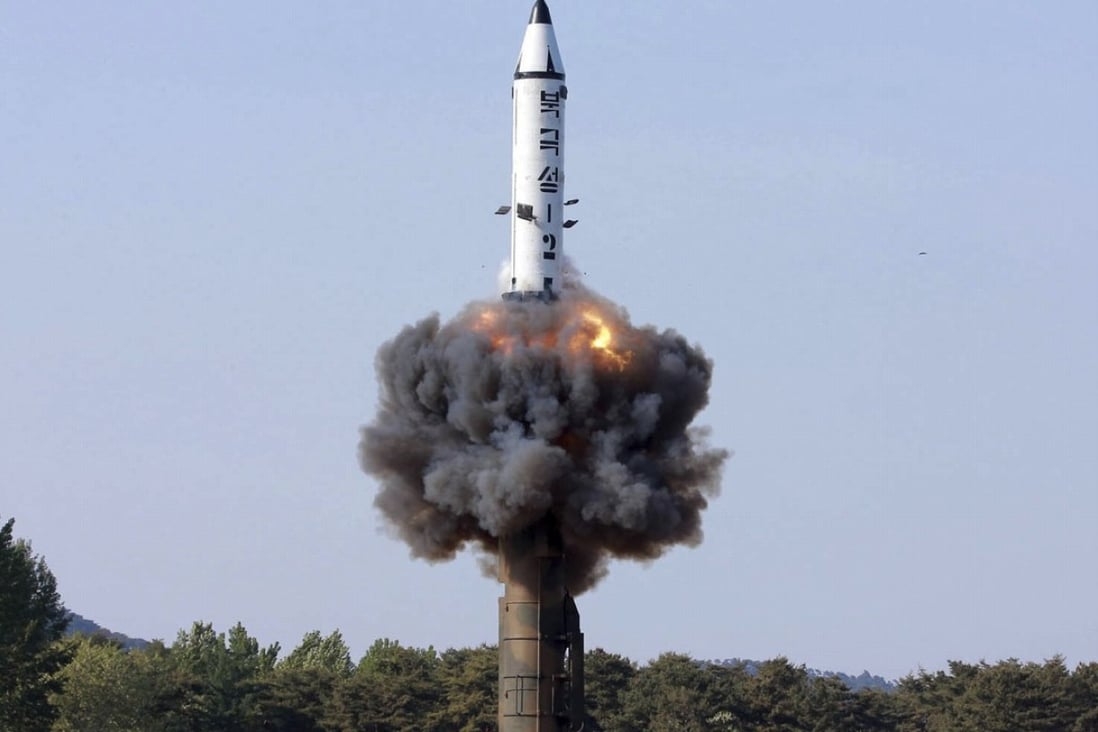 North Korea tests a solid-fuel rocket in this May 22 photo distributed by the North Korean government. Photo: AP