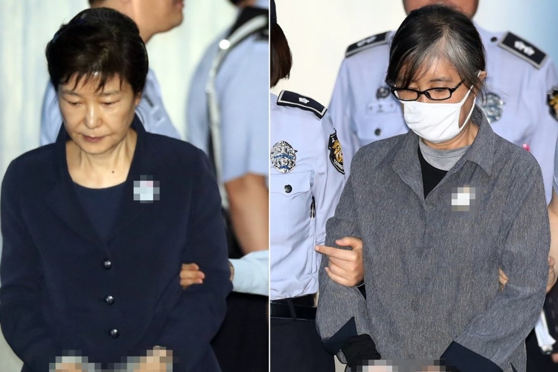 South Korea’s former president Park Geun-hye and her confidante Choi Soon-sil. Photo: EPA