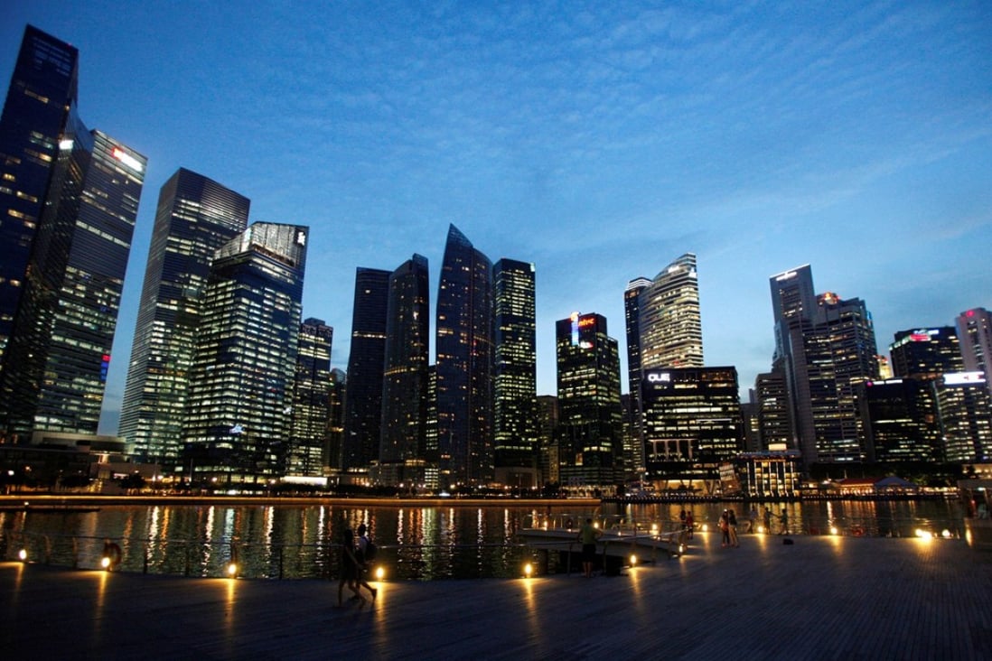 Singapore’s GDP data has distortions that present an overly-rosy picture when compared with Hong Kong. Photo: Reuters