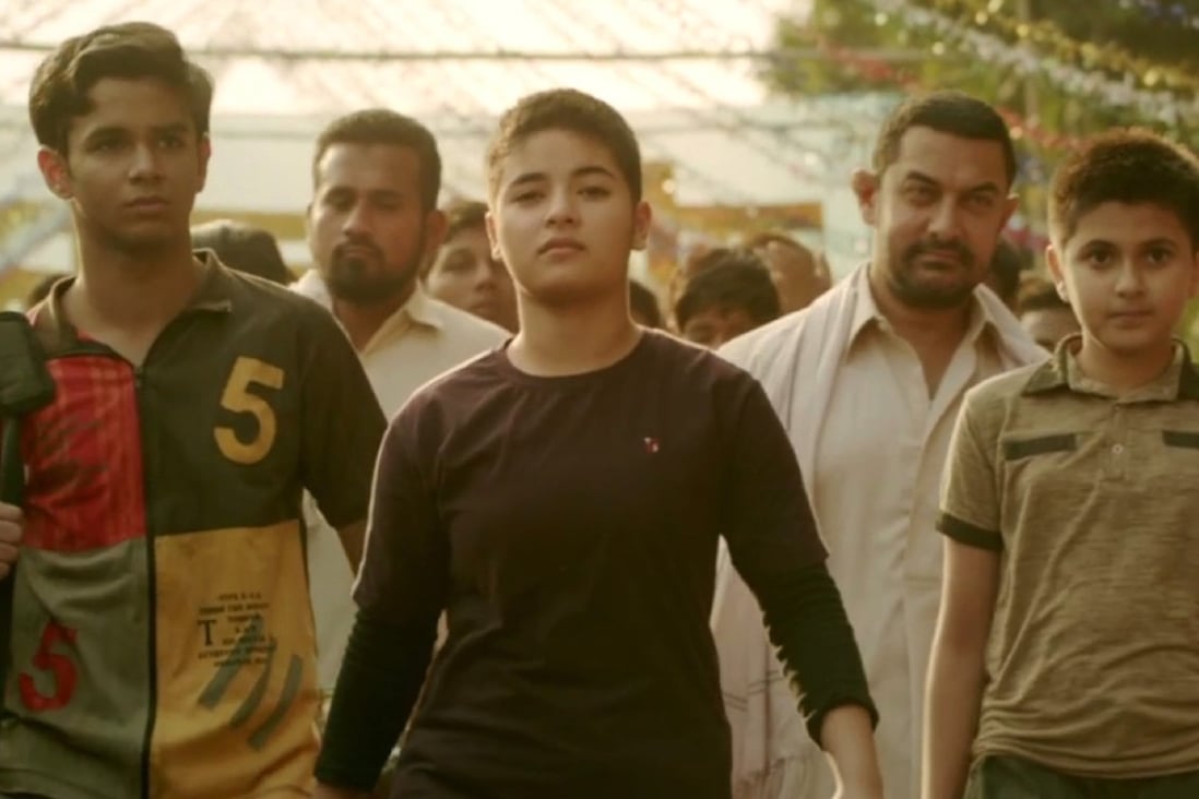 A still from the movie Dangal, featuring Aamir Khan (second from right). Photo: Handout)