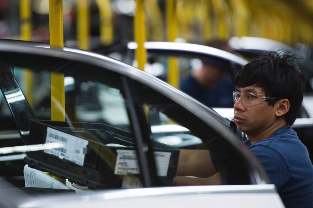 An American worker pictured at a car factory in Alabama run by the German firm Mercedes-Benz. Photo: AFP