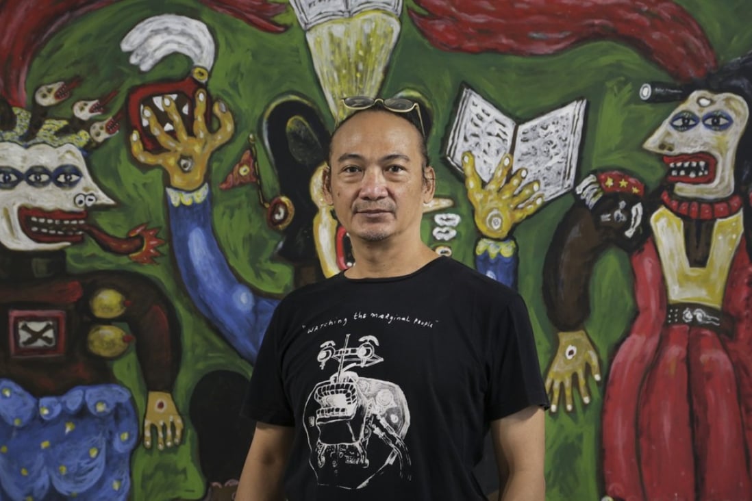 Indonesian artist Heri Dono, pictured here in front of his 2015 work ‘Between two cards’, is currently exhibiting at Tang Contemporary Art in Central. Photo: James Wendlinger