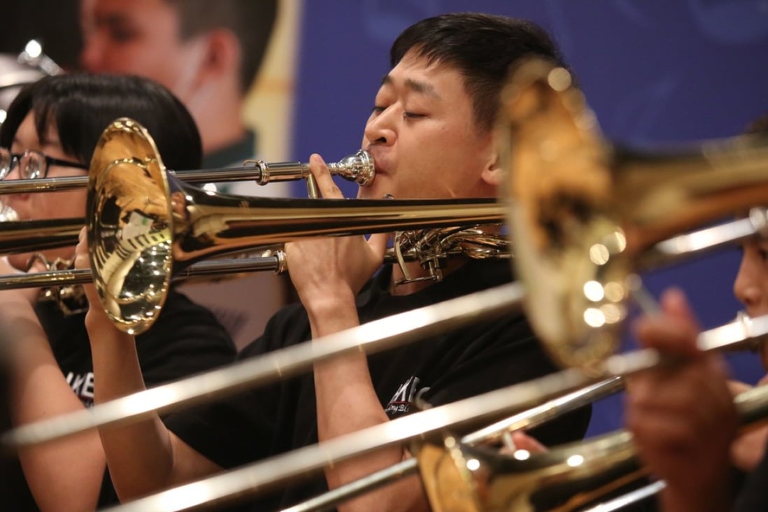 Members of the Hong Kong Blind Orchestra play their hearts out at their launch. Photo: Sam Tsang
