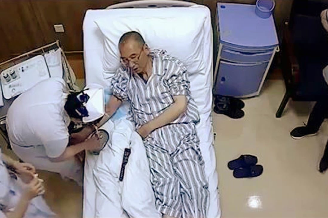 A screenshot from YouTube shows a man believed to be China's Nobel Peace Prize laureate Liu Xiaobo receiving medical treatment in hospital. Photo: Kyodo