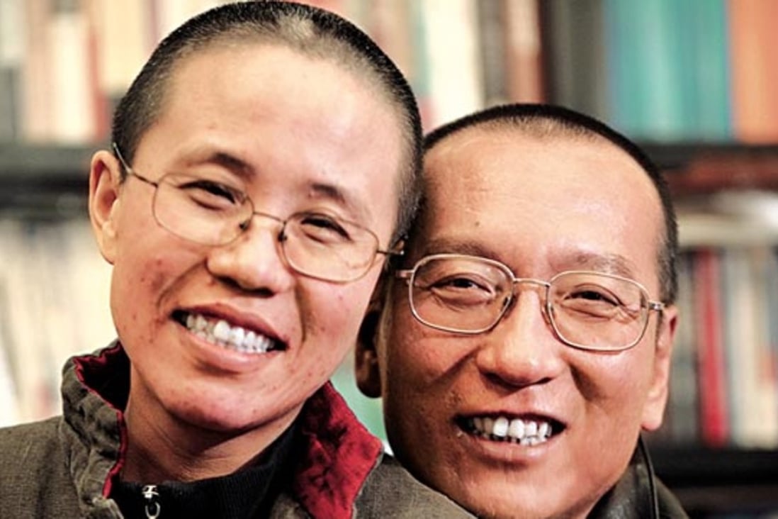 Chinese dissident Liu Xiaobo, right, and his wife Liu Xia are shown in an undated photo released by his family in October 2010. Photo: Reuters