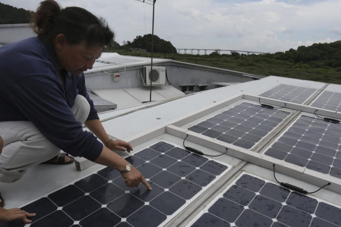 Tai O resident Fung Chuen-tai has 25 solar panels on her roof. Photo: May Tse