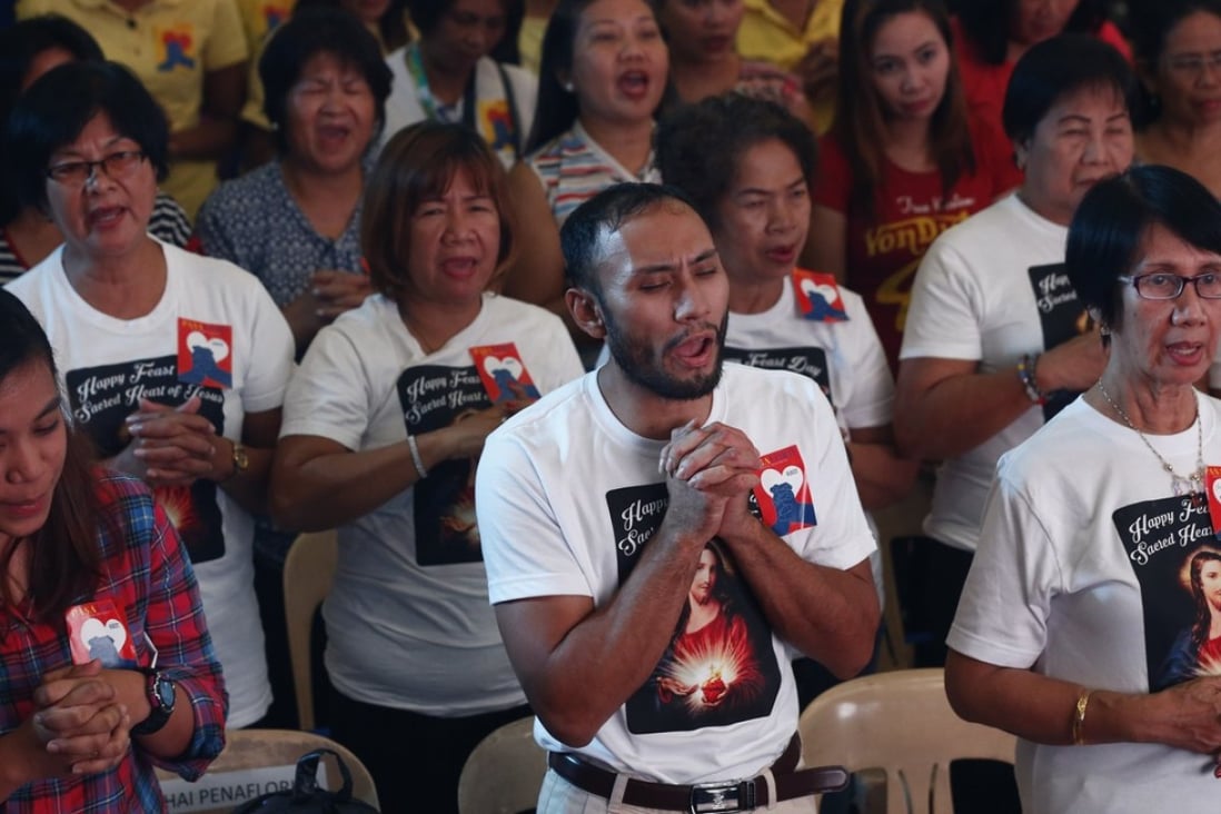 Filipinos gather for an inter-faith prayer service in Quezon City, east of Manila, Philippines. The interfaith prayer service, carried the message of peace, unity and safety from foreign invasion and terrorism. Photo: EPA