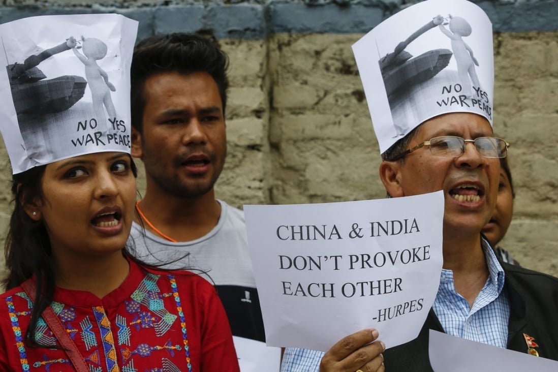 Nepalese human rights activists protest in front of the Chinese Embassy in Kathmandu over the growing tension between China and India. Photo: EPA