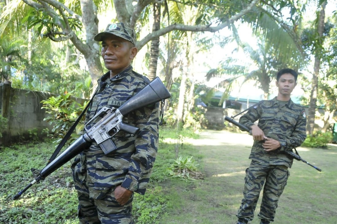 File photo of Moro Islamic Liberation Front (MILF) fighters in Maguindanao province. Photo: Reuters