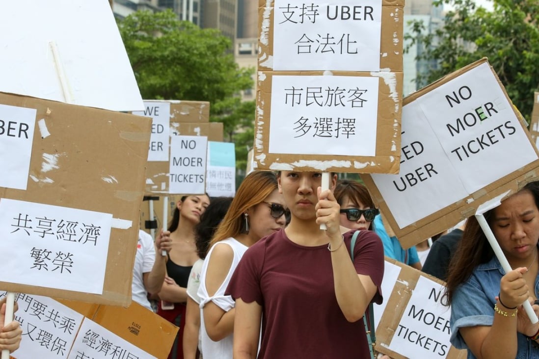 Uber supporters march in Macau last year after the company said it would pull out of the city. Photo: Dickson Lee