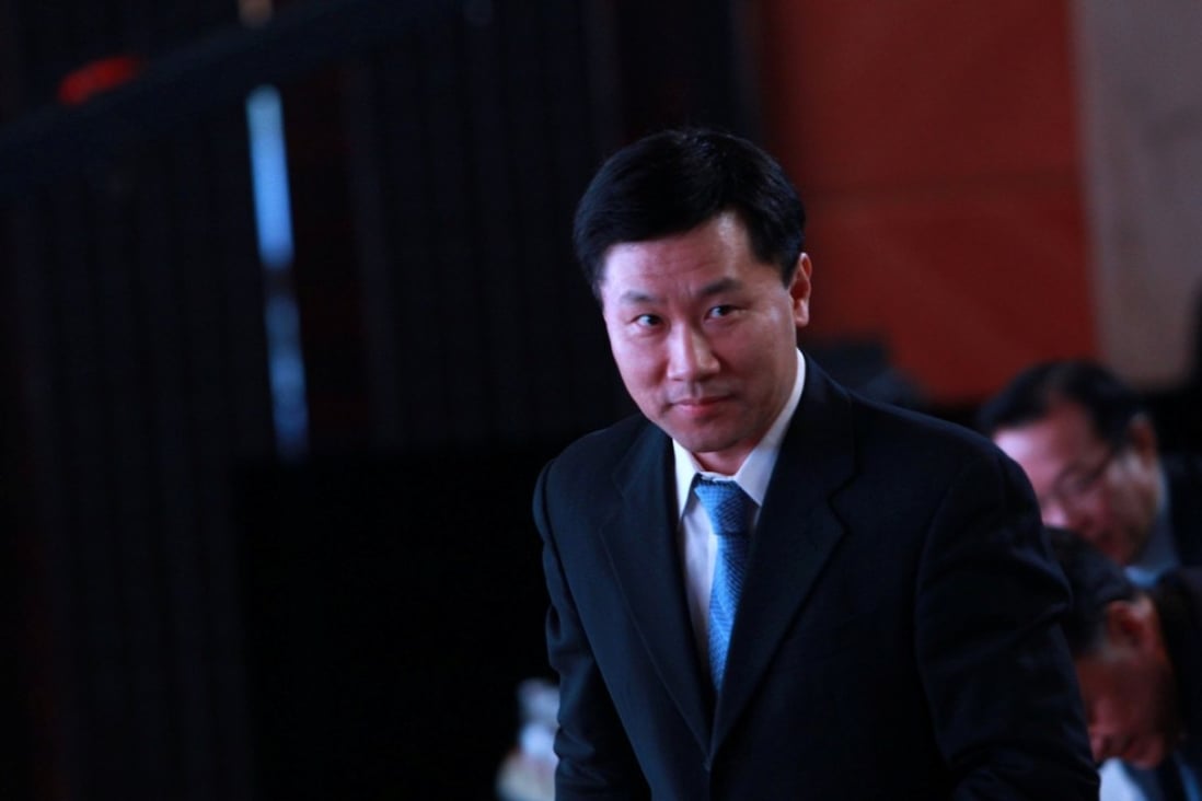 Yao Gang, former vice chairman of the China Securities Regulatory Commission, while attending a forum in Beijing on November 25, 2013. Photo: Reuters