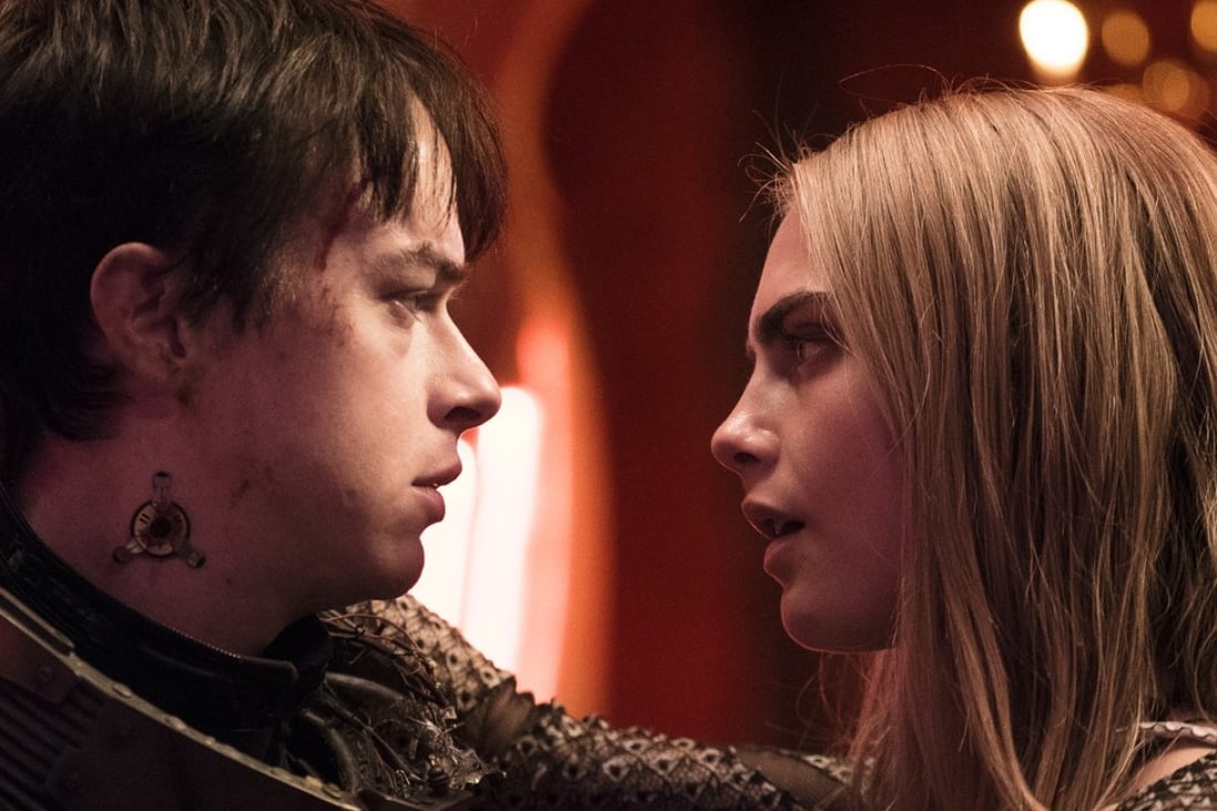 Dane DeHaan as Major Valerian and Cara Delevingne as Sergeant Laureline in Valerian and the City of a Thousand Planets.