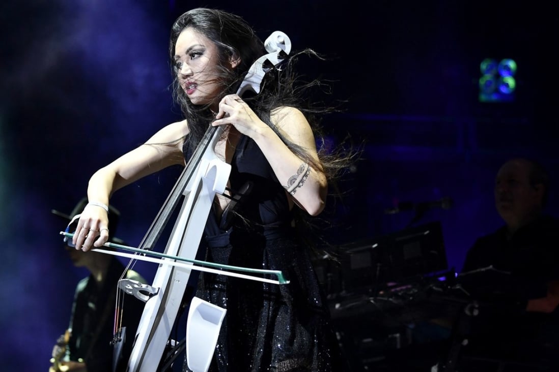 Cellist Tina Guo performs with Hans Zimmer at the Coachella Valley Music and Arts Festival in April. Photo: AFP