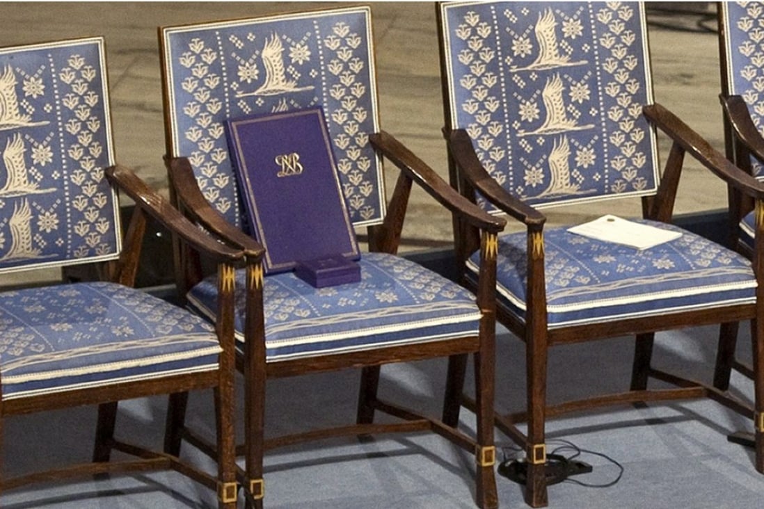 The Nobel Peace Prize medal and diploma meant for Chinese dissident Liu Xiaobo sit on an empty chair that he would have occupied, during the awards ceremony in Oslo in December 2010. Liu was at the time serving an 11-year prison term for inciting subversion of state power. Photo: AFP