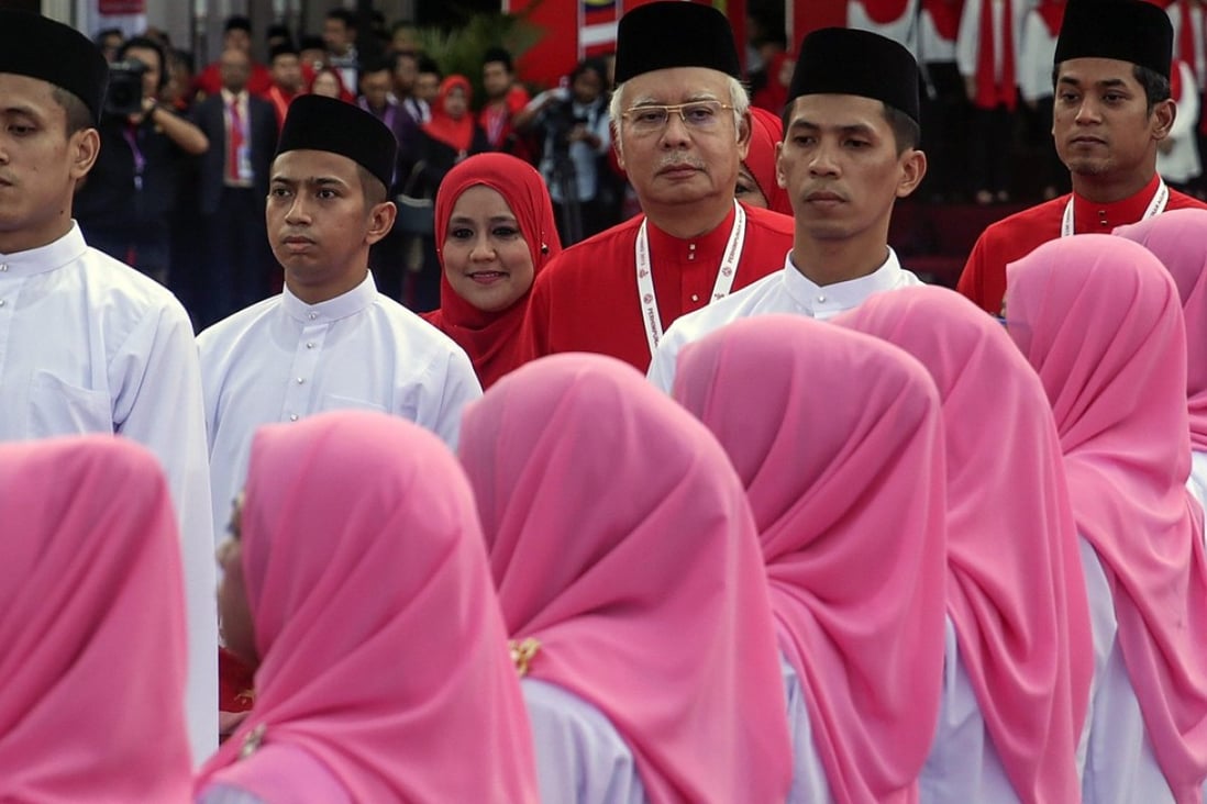 Prime Minister and Umno president Najib Razak (in red) during the opening ceremony of the ruling party’s 69th general assembly in Kuala Lumpur, in December 2015. Photo: EPA