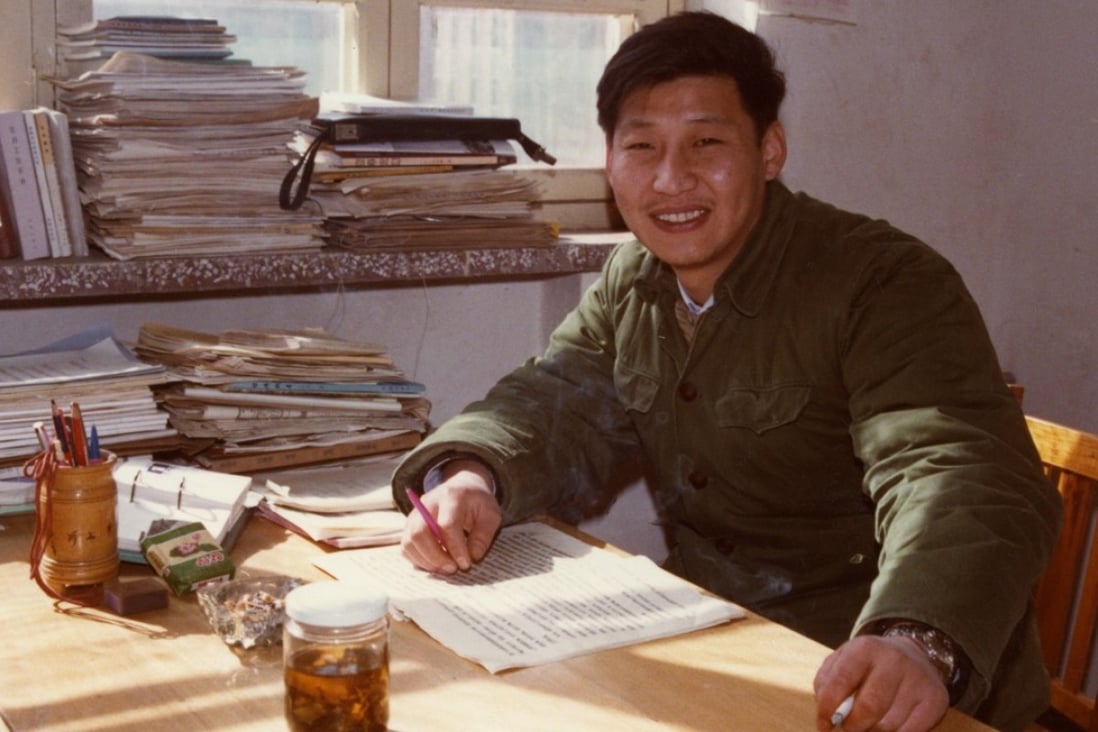 Xi Jinping sits in his office in Zhengding county, north China's Hebei province, in this 1983 photo. (Xinhua)