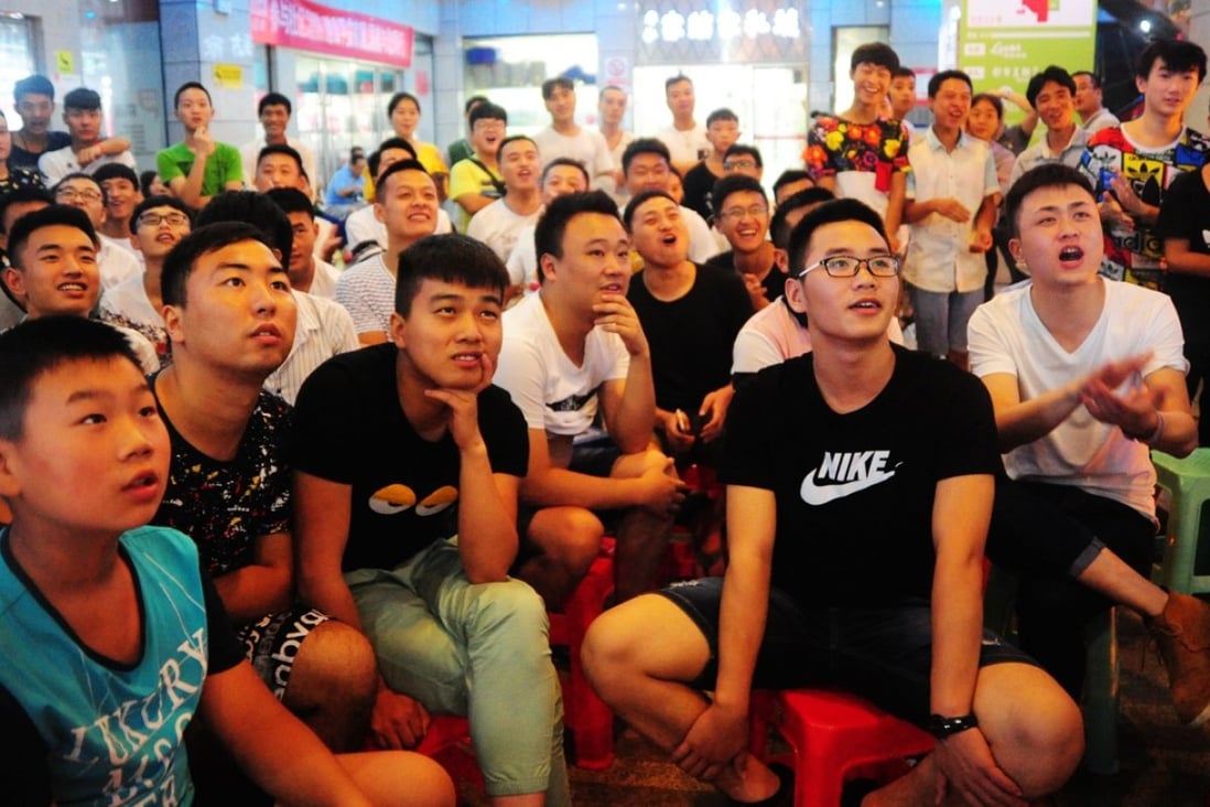 Audience watch a live broadcast of a League of Legends competition in Chongqing, southwestern China. Photo: ImagineChina