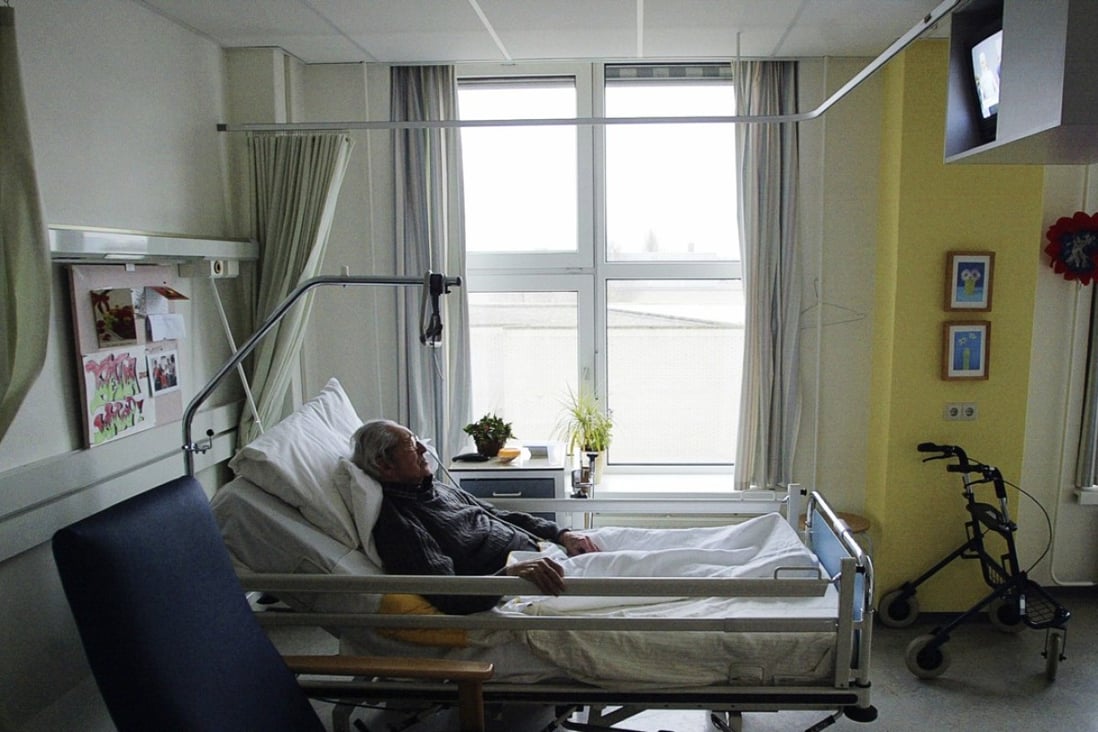 An unidentified man suffering from Alzheimer's disease and who refused to eat sleeps peacefully the day before passing away in a nursing home in the Netherlands. Photo: Reuters