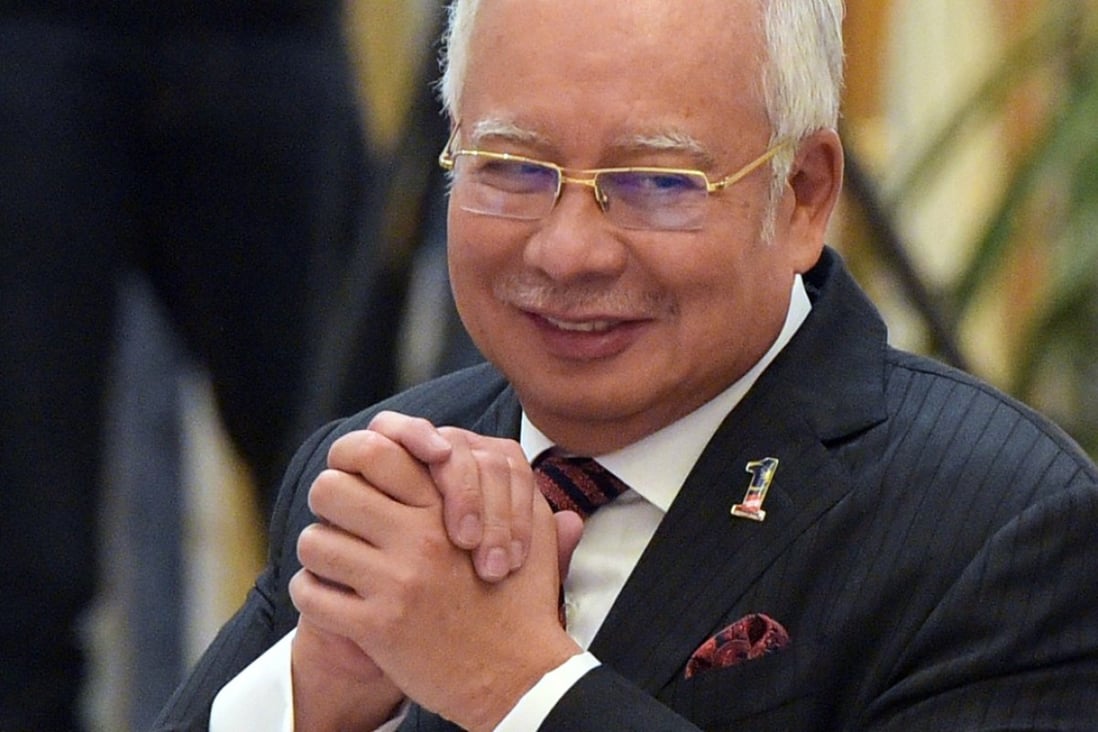 Malaysian Prime Minister Najib Razak must court the civil service vote if he is to cling to power. But its bloated nature could be financially disastrous for the country. Photo: AFP
