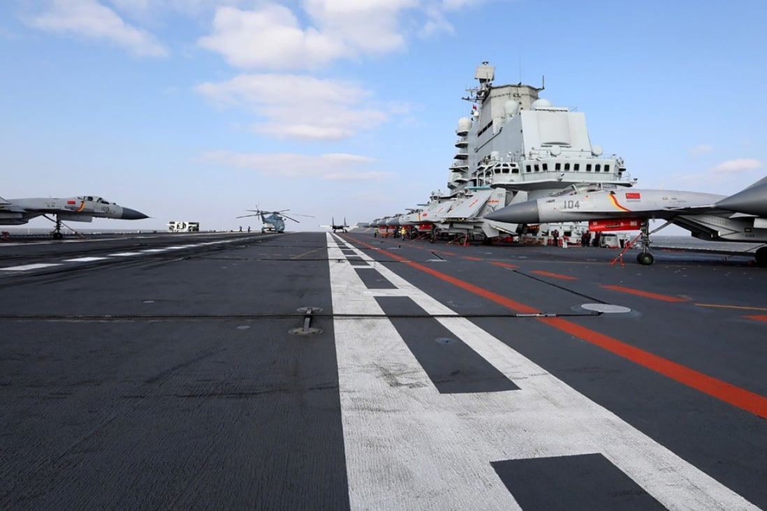 Chinese J-15 fighter jets on the deck of the Liaoning aircraft carrier during military drills in the Yellow Sea in December. Photo: AFP