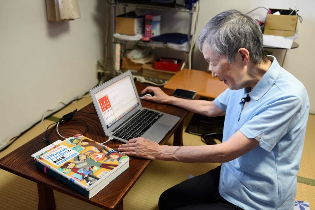 Masako Wakamiya use her laptop in her home in Fujisawa. Photo: AFP